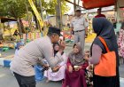 Pojok Kamtibmas Polres Ngawi Hadir di Pasar Krompol Ajak Warga Jaga Kamtibmas